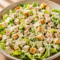 Caesar — Turkey breast, lettuce, croutons, shaved grana and caesar dressing