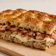 Profonda — Peppered pancetta, smoked provola, porcini cream and crumbled tarallo